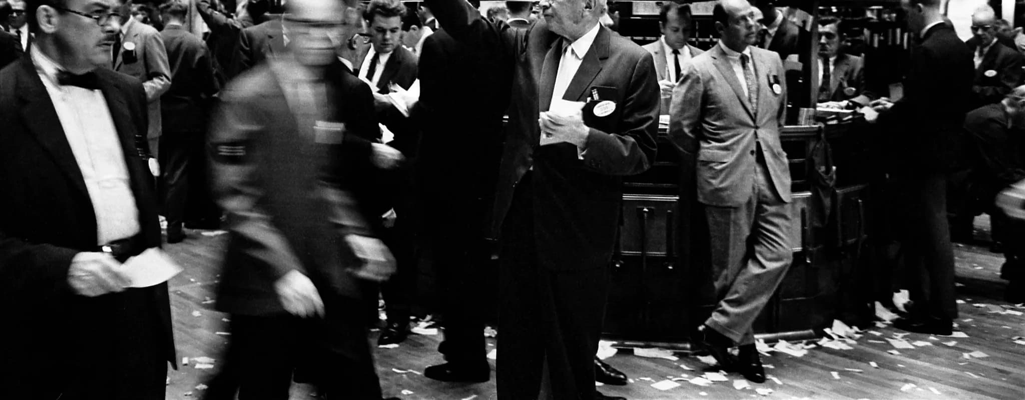 Traders work on the crowded New York Stock Exchange floor.